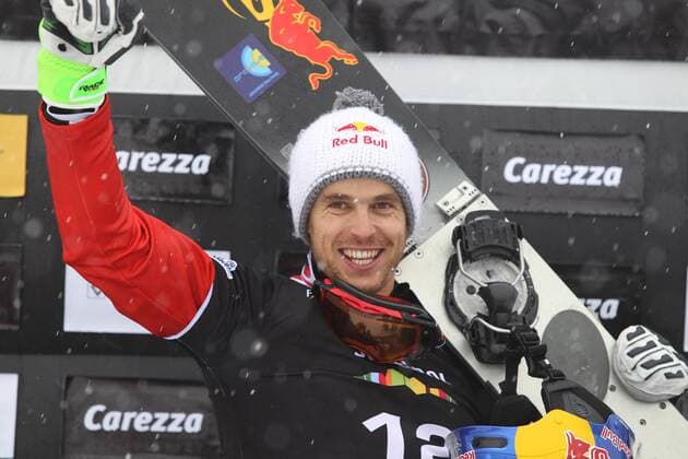 SNOWBOARD - FIS WC Carezza, qualification CAREZZA,ITALY,16.DEC.14 - SNOWBOARD - FIS World Cup, parallel giant slalom, men, award ceremony. Image shows the rejoicing of Roland Fischnaller (ITA).