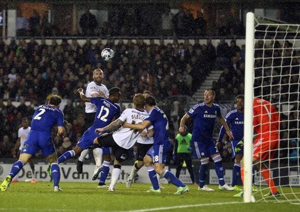 Jake Buxton of Derby County rises up only to head wide - Capital One Cup Quarter Final - Derby vs Chelsea - iPro Stadium - Derby - England - 16th December 2014 - Picture Simon Bellis Sportimage EDITORIAL USE ONLY. No use with unauthorised audio, video, data, fixture lists, club league logos or live services. Online in-match use limited to 120 images, no video emulation. No use in betting, games or single club league player publications.