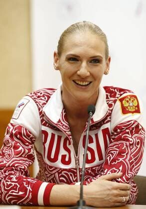 MOSCOW, RUSSIA. DECEMBER 19, 2014. Three-time Olympic champion in synchronised swimming Svetlana Romashina looks on at a press conference PK Pressekonferenz on the synchronised swimming show at the Olimpiysky Sports Complex. Mikhail Japaridze TASS  RE1582F6