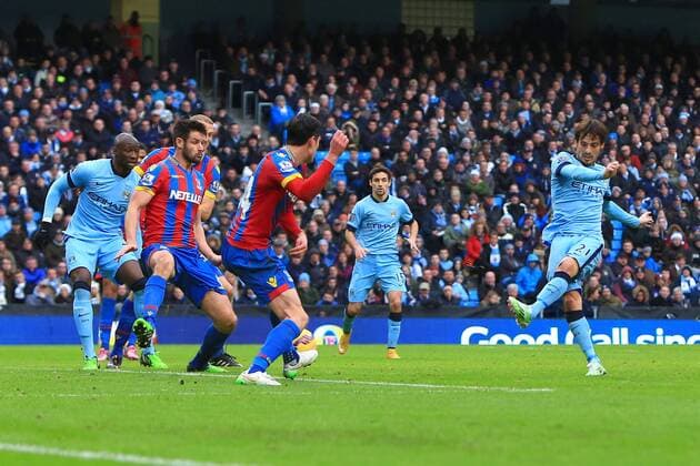 David Silva of Manchester City scores his sides second goal - Manchester City vs. Crystal Palace - Barclay s Premier League - Etihad Stadium - Manchester - 20 12 2014 EDITORIAL USE ONLY. No use with unauthorised audio, video, data, fixture lists, club league logos or live services. Online in-match use limited to 120 images, no video emulation. No use in betting, games or single club league player publications.