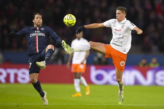 Maxwell (PSG) vs Jonas MARTIN (Montpellier) FOOTBALL : PSG vs Montpellier - L1 - 20 12 2014 JBAutissier Panoramic 