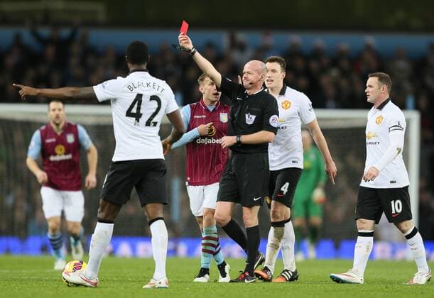 Refer Lee Mason shows the red card to Gabriel Agbonlahor of Aston Villa - Barclays Premier League - Aston Villa vs Manchester United Villa Park Stadium - Birmingham - England - 20th December 2014 - Picture SimonBellis Sportimage EDITORIAL USE ONLY. No use with unauthorised audio, video, data, fixture lists, club league logos or live services. Online in-match use limited to 120 images, no video emulation. No use in betting, games or single club league player publications.