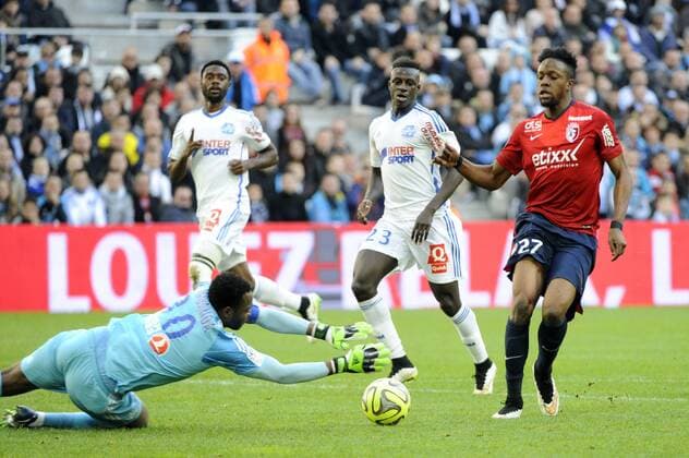 Aktuell Fußball, Frankreich, Ligue 1, Olympique marseille - OSC Lille Divock ORIGI - NICOLAS NKOULOU - BENJAMIN MENDY FOOTBALL : Marseille vs Lille- Ligue 1 - 21 12 2014 FEP Panoramic 