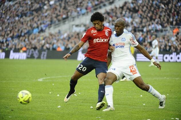 Aktuell Fußball, Frankreich, Ligue 1, Olympique Marseille - OSC Lille Da Graca Mendes (Lille) - Fanni (OM) FOOTBALL : Marseille vs Lille - Ligue 1 - 21 12 2014 FranckPennant Panoramic 