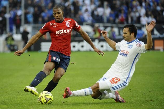 Aktuell Fußball, Frankreich, Ligue 1, Olympique Marseille - OSC Lille Sidibe (Lille) - Morel (OM) FOOTBALL : Marseille vs Lille - Ligue 1 - 21 12 2014 FranckPennant Panoramic 