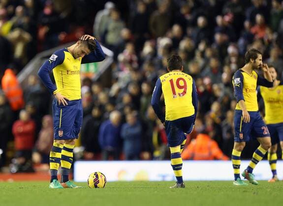 Arsenal s Olivier Giroud looks on dejected after going 1-0 down Barclays Premier League - Liverpool vs Arsenal - Anfield - England - 21st December 2014 - Picture David Klein Sportimage EDITORIAL USE ONLY. No use with unauthorised audio, video, data, fixture lists, club league logos or live services. Online in-match use limited to 120 images, no video emulation. No use in betting, games or single club league player publications.