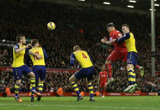 Aktuell Fußball, England, Premier League, FC Liverpool - FC Arsenal Liverpool s Martin Skrtel scoring his sides second goal Barclays Premier League - Liverpool vs Arsenal - Anfield - England - 21st December 2014 - Picture David Klein Sportimage EDITORIAL USE ONLY. No use with unauthorised audio, video, data, fixture lists, club league logos or live services. Online in-match use limited to 120 images, no video emulation. No use in betting, games or single club league player publications.