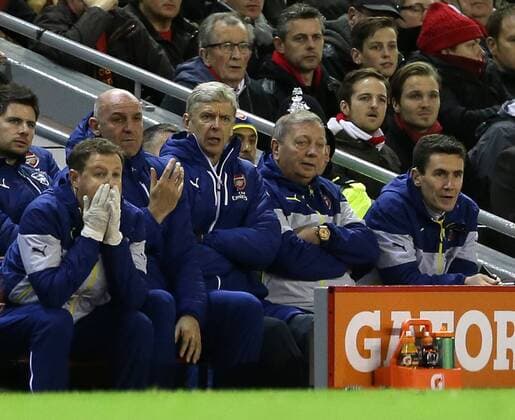 Arsenal s Arsene Wenger looks on Barclays Premier League - Liverpool vs Arsenal - Anfield - England - 21st December 2014 - Picture David Klein Sportimage EDITORIAL USE ONLY. No use with unauthorised audio, video, data, fixture lists, club league logos or live services. Online in-match use limited to 120 images, no video emulation. No use in betting, games or single club league player publications.