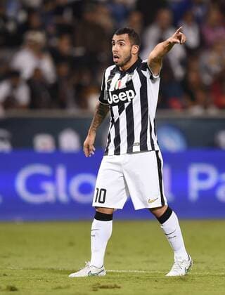 FUSSBALL INTERNATIONAL Supercoppa Italia Finale 2014 in Doha Juventus Turin - SSC Neapel 22.12.2014 Carlos Tevez (Juventus Turin) 