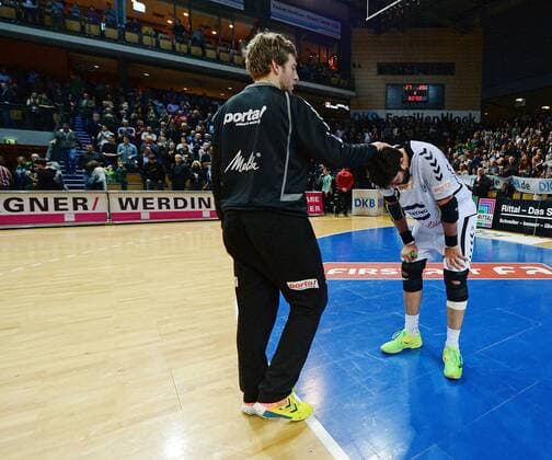 23.12.2014, xjhx, Handball HBL, HSG Wetzlar - GWD Minden, v.l. Enttäuschte Mindener Spieler nach Spielende