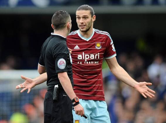 Football - 2014 2015 Premier League - Chelsea vs. West Ham United West ham s Andy Carroll makes his point to referee Michael Oliver at Stamford Bridge. COLORSPORT ANDREW COWIE 