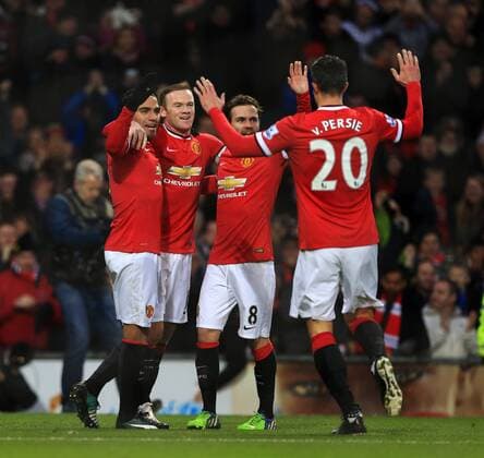 Manchester United ManU s Wayne Rooney celebrates scoring his sides opening goal Barclays Premier League - Manchester United vs Newcastle United - Old Trafford - England - 26th December 2014 - Picture David Klein Sportimage EDITORIAL USE ONLY. No use with unauthorised audio, video, data, fixture lists, club league logos or live services. Online in-match use limited to 120 images, no video emulation. No use in betting, games or single club league player publications.