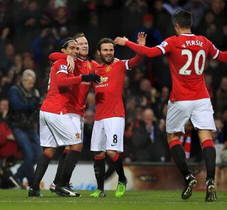 Manchester United ManU s Wayne Rooney celebrates scoring his sides opening goal Barclays Premier League - Manchester United vs Newcastle United - Old Trafford - England - 26th December 2014 - Picture David Klein Sportimage EDITORIAL USE ONLY. No use with unauthorised audio, video, data, fixture lists, club league logos or live services. Online in-match use limited to 120 images, no video emulation. No use in betting, games or single club league player publications.