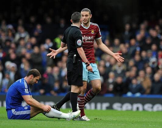 Andy Carroll of West Ham United appeals to Referee Michael Oliver after his challenge on Branislav Ivanovic of Chelsea - Barclays Premier League - Chelsea vs West Ham United - Stamford Bridge Stadium - London - England - 26th December 2014 - Pic Robin Parker Sportimage EDITORIAL USE ONLY. No use with unauthorised audio, video, data, fixture lists, club league logos or live services. Online in-match use limited to 120 images, no video emulation. No use in betting, games or single club league player publications. DSC_7792.JPG