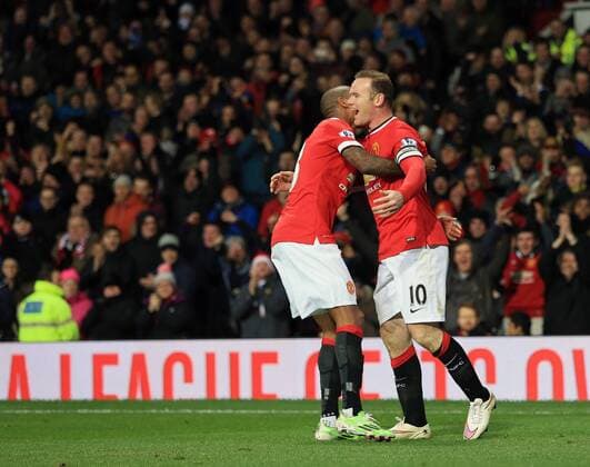 Manchester United ManU s Wayne Rooney celebrates scoring his sides second goal Barclays Premier League - Manchester United vs Newcastle United - Old Trafford - England - 26th December 2014 - Picture David Klein Sportimage EDITORIAL USE ONLY. No use with unauthorised audio, video, data, fixture lists, club league logos or live services. Online in-match use limited to 120 images, no video emulation. No use in betting, games or single club league player publications.