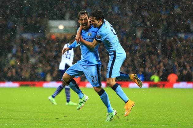 David Silva of Manchester City celebrates scoring the third goal - West Bromwich Albion vs. Manchester City - Barclay s Premier League - The Hawthorns - Birmingham - 26 12 2014 Pic Philip Oldham Sportimage EDITORIAL USE ONLY. No use with unauthorised audio, video, data, fixture lists, club league logos or live services. Online in-match use limited to 120 images, no video emulation. No use in betting, games or single club league player publications.