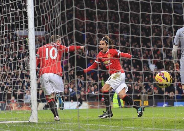 Manchester United ManU s Radamel Falcao celebrates his sides opening goal Barclays Premier League - Manchester United vs Newcastle United - Old Trafford - England - 26th December 2014 - Picture David Klein Sportimage EDITORIAL USE ONLY. No use with unauthorised audio, video, data, fixture lists, club league logos or live services. Online in-match use limited to 120 images, no video emulation. No use in betting, games or single club league player publications.