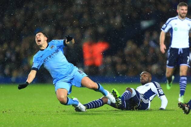 West Brom s Youssuf Mulumbu tackles Samir Nasri of Manchester City - West Bromwich Albion vs. Manchester City - Barclay s Premier League - The Hawthorns - Birmingham - 26 12 2014 Pic Philip Oldham Sportimage EDITORIAL USE ONLY. No use with unauthorised audio, video, data, fixture lists, club league logos or live services. Online in-match use limited to 120 images, no video emulation. No use in betting, games or single club league player publications.