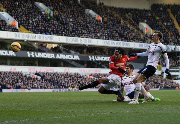 Manchester United ManU s Radamel Falcao fires in a shot Barclays Premier League - Tottenham Hotspur vs Manchester United - White Hart Lane - England - 28th December 2014 - Picture David Klein Sportimage EDITORIAL USE ONLY. No use with unauthorised audio, video, data, fixture lists, club league logos or live services. Online in-match use limited to 120 images, no video emulation. No use in betting, games or single club league player publications.
