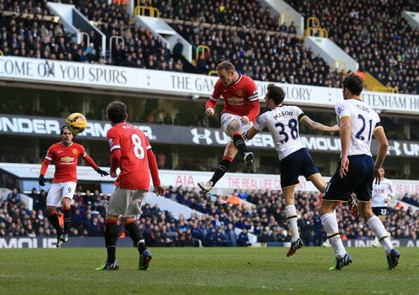 Manchester United ManU s Wayne Rooney fires in a header Barclays Premier League - Tottenham Hotspur vs Manchester United - White Hart Lane - England - 28th December 2014 - Picture David Klein Sportimage EDITORIAL USE ONLY. No use with unauthorised audio, video, data, fixture lists, club league logos or live services. Online in-match use limited to 120 images, no video emulation. No use in betting, games or single club league player publications.