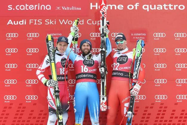 ALPINE SKIING - FIS WC Santa Caterina SANTA CATERINA,ITALY,28.DEC.14 - ALPINE SKIING - FIS World Cup, downhill men, award ceremony. Image shows the rejoicing of Matthias Mayer (AUT), Travis Ganong (USA) and Dominik Paris (ITA).