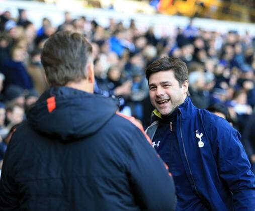 Tottenham s Mauricio Pochettino greets Manchester United ManU s Louis Van Gaal Barclays Premier League - Tottenham Hotspur vs Manchester United - White Hart Lane - England - 28th December 2014 - Picture David Klein Sportimage EDITORIAL USE ONLY. No use with unauthorised audio, video, data, fixture lists, club league logos or live services. Online in-match use limited to 120 images, no video emulation. No use in betting, games or single club league player publications.