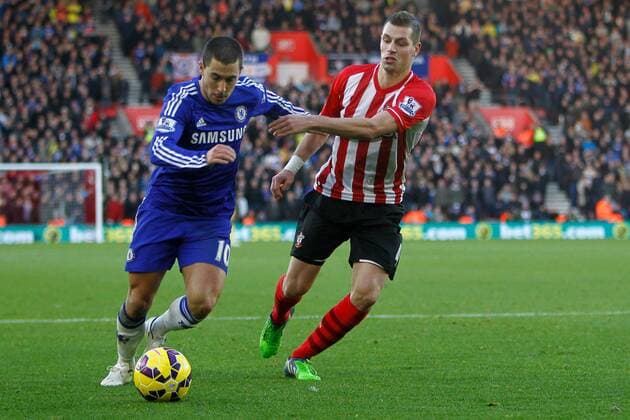 Football - 2014 2015 Premier League - Southampton vs. Chelsea Eden Hazard of Chelsea and Southampton s Morgan Schneiderlin in action at St Mary s Stadium Southampton Colorsport Shaun Boggust