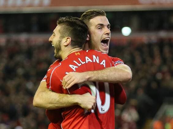 Adam Lallana of FC Liverpool celebrates with Jordan Henderson of FC Liverpool - Barclays Premier League - FC Liverpool vs Swansea City - Anfield Stadium - Liverpool - England - 29th December 2014 - EDITORIAL USE ONLY. No use with unauthorised audio, video, data, fixture lists, club league logos or live services. Online in-match use limited to 120 images, no video emulation. No use in betting, games or single club league player publications.