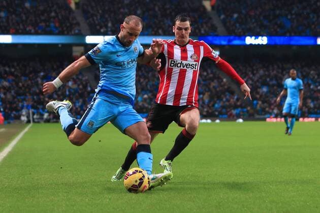 Pablo Zabaleta of Manchester City and Adam Johnson of Sunderland - Manchester City vs. Sunderland - Barclay s Premier League - Etihad Stadium - Manchester - 28 12 2014 Pic Philip Oldham Sportimage EDITORIAL USE ONLY. No use with unauthorised audio, video, data, fixture lists, club league logos or live services. Online in-match use limited to 120 images, no video emulation. No use in betting, games or single club league player publications.