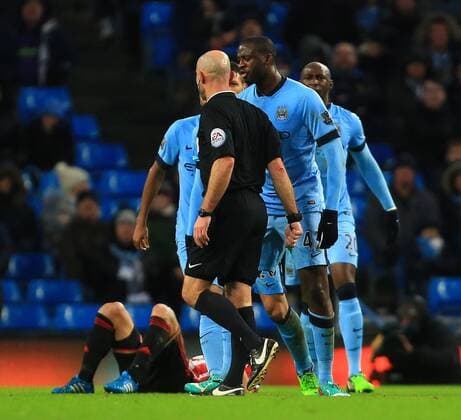 Yaya Toure of Manchester City confronts the referee - Manchester City vs. Sunderland - Barclay s Premier League - Etihad Stadium - Manchester - 28 12 2014 Pic Philip Oldham Sportimage EDITORIAL USE ONLY. No use with unauthorised audio, video, data, fixture lists, club league logos or live services. Online in-match use limited to 120 images, no video emulation. No use in betting, games or single club league player publications.