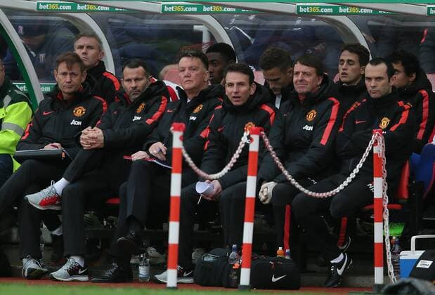 Louis van Gaal manager of Manchester United ManU watches from the bench - Barclays Premier League - Stoke City vs Manchester Utd - Stoke - England - 1st January 2015 - Picture Simon Bellis Sportimage EDITORIAL USE ONLY. No use with unauthorised audio, video, data, fixture lists, club league logos or live services. Online in-match use limited to 120 images, no video emulation. No use in betting, games or single club league player publications.