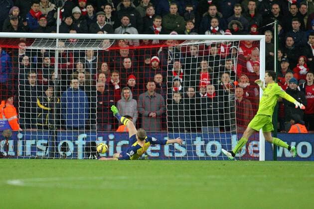 Football - 2014 2015 Premier League - Southampton vs. Arsenal Per Mertesacker of Arsenal fails to stop Southampton s Sadio Mane effort on goal to put Saints one nil up at St Mary s Stadium Southampton Colorsport Shaun Boggust 