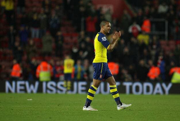 Football - 2014 2015 Premier League - Southampton vs. Arsenal Theo Walcott of Arsenal applauds the Southampton fans at the final whistle at St Mary s Stadium Southampton Colorsport Shaun Boggust 