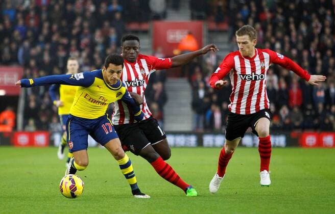 Football - 2014 2015 Premier League - Southampton vs. Arsenal Alexis Sanchez of Arsenal and Southampton s Victor Wanyama in action at St Mary s Stadium Southampton Colorsport Shaun Boggust 