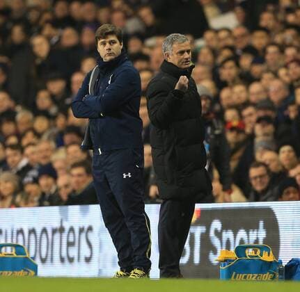 Tottenham s Mauricio Pochettino with Chelsea s Jose Mourinho Barclays Premier League - Tottenham Hotspur vs Chelsea - White Hart Lane - England - 1st January 2015 - Picture David Klein Sportimage EDITORIAL USE ONLY. No use with unauthorised audio, video, data, fixture lists, club league logos or live services. Online in-match use limited to 120 images, no video emulation. No use in betting, games or single club league player publications.
