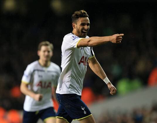 Tottenham s Nacer Chadli celebrates scoring his sides fifth goal Barclays Premier League - Tottenham Hotspur vs Chelsea - White Hart Lane - England - 1st January 2015 - Picture David Klein Sportimage EDITORIAL USE ONLY. No use with unauthorised audio, video, data, fixture lists, club league logos or live services. Online in-match use limited to 120 images, no video emulation. No use in betting, games or single club league player publications.
