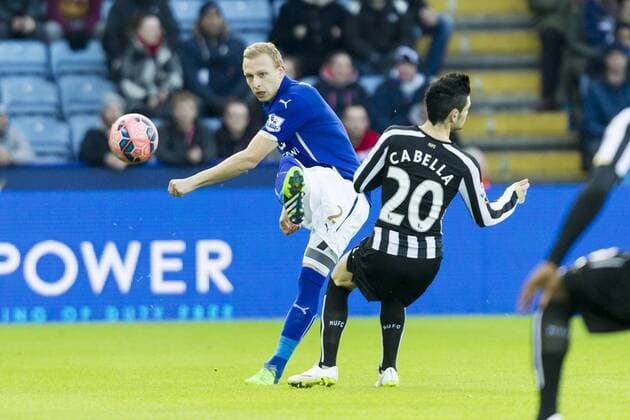 03.01.2015. Leicester, England. FA Cup 3rd Round. Leicester versus Newcastle United. Richie De Laet of Leicester City clears the ball under pressure from Remy Cabella (Newcastle United). xGrahamxWilsonx  ActionPlus11586405