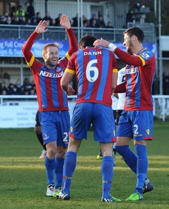 Football - 2014 2015 FA Cup - Third Round: Dover Athletic vs. Crystal Palace Palace s Scott Dann celebrates his 2nd goal with Barry Bannan and Damien Delaney at the Crabble Athletic Ground. COLORSPORT ANDREW COWIE 