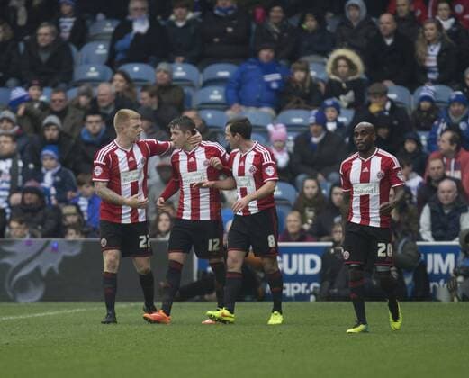 04.01.2015. London, England. FA Cup 3rd Round. QPR versus Sheffield United. Sheffield United players celebrate their opening goal. xNigelxCookex  ActionPlus11586707