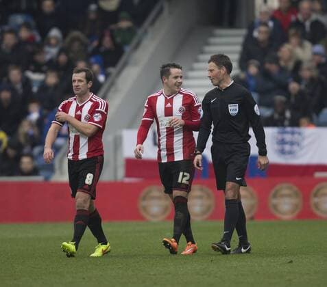 04.01.2015. London, England. FA Cup 3rd Round. QPR versus Sheffield United. Goalscorer Sheffield United s Marc McNulty shares a smile with Mark Clattenburg, today s referee. xNigelxCookex  ActionPlus11586708