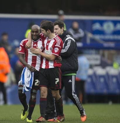 04.01.2015. London, England. FA Cup 3rd Round. QPR versus Sheffield United. Sheffield United s Ryan Flynn and Jamal Campbell-Ryce celebrate their sides victory after the game. xNigelxCookex  ActionPlus11586751