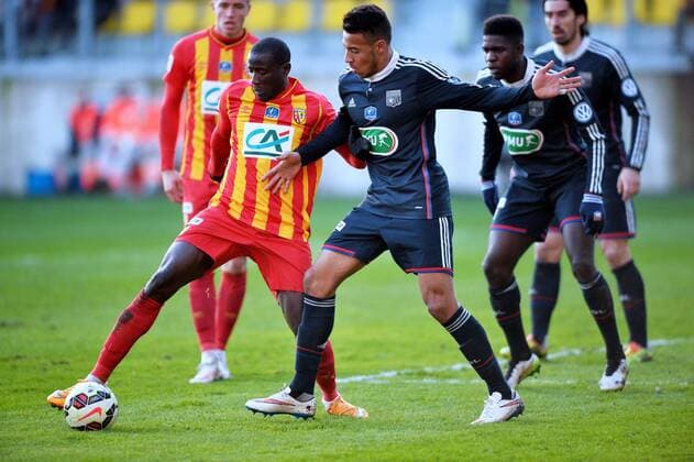 Adamo Coulibaly (len) - Corentin Tolisso (lyo) FOOTBALL : Lens vs Lyon - Coupe de France - 32eme - 04 01 2015 AnthonyBIBARD FEP Panoramic 