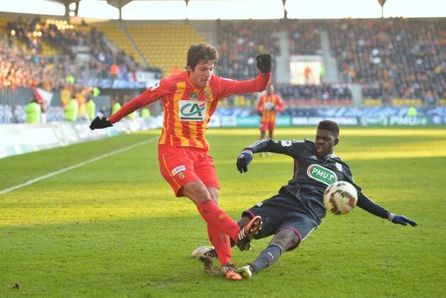 Pablo Chavarria (len) - Samuel Umtiti (ol) FOOTBALL : Lens vs Lyon - Coupe de France - 32eme - 04 01 2015 AnthonyBIBARD FEP Panoramic 