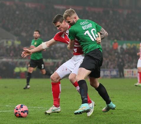 Andy Bishop of Wrexham has his shirt pulled in the penalty area by Robert Huth of Stoke City - FA Cup Third Round - Stoke City vs Wrexham - Britannia Stadium - Stoke on Trent - England - 4th January 2015 - Picture Simon Bellis Sportimage EDITORIAL USE ONLY. No use with unauthorised audio, video, data, fixture lists, club league logos or live services. Online in-match use limited to 120 images, no video emulation. No use in betting, games or single club league player publications.