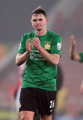 A dejected Johnny Hunt of Wrexham applauds the fans - FA Cup Third Round - Stoke City vs Wrexham - Britannia Stadium - Stoke on Trent - England - 4th January 2015 - Picture Simon Bellis Sportimage EDITORIAL USE ONLY. No use with unauthorised audio, video, data, fixture lists, club league logos or live services. Online in-match use limited to 120 images, no video emulation. No use in betting, games or single club league player publications.
