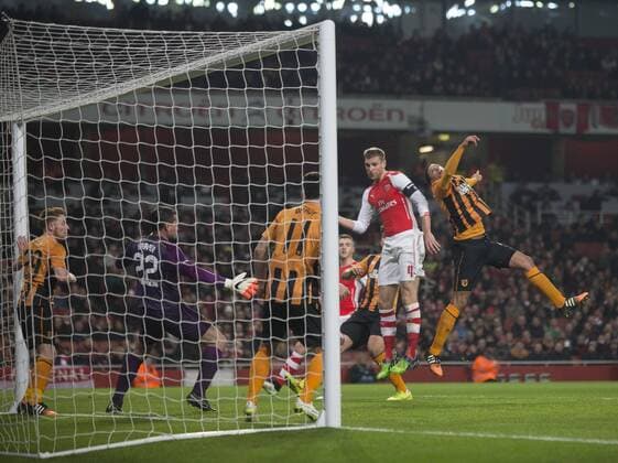 04.01.2015. London, England. FA Cup 3rd Round. Arsenal versus Hull. Arsenal s Per Mertesacker watches as his header finds the net to make it 1-0. xNigelxCookex  ActionPlus11586952