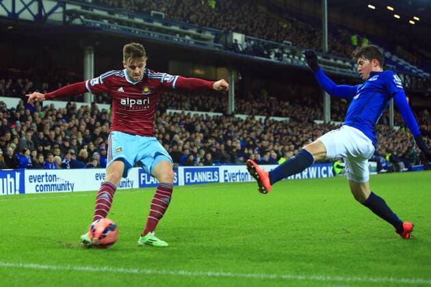 Bryan Oviedo of Everton defends against West HamâÄ?s Carl Jenkinson - Everton vs. West Ham United - FA Cup Third Round - Goodison Park - Liverpool - 06 01 2015 Pic Philip Oldham Sportimage EDITORIAL USE ONLY. No use with unauthorised audio, video, data, fixture lists, club league logos or live services. Online in-match use limited to 120 images, no video emulation. No use in betting, games or single club league player publications.