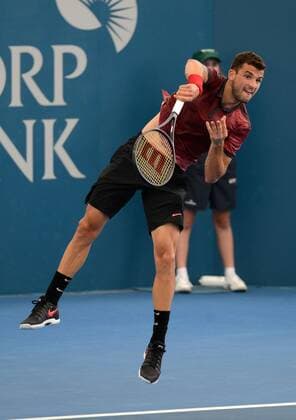 Grigor Dimitrov (BUL) in Aktion. Brisbane International 2015, Brisbane, Australien