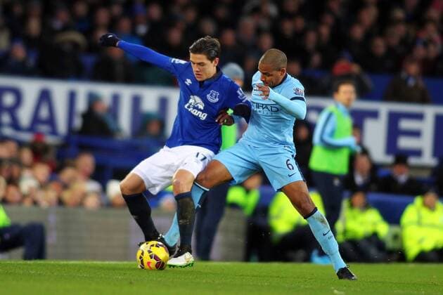 10.01.2015. Liverpool, England. Barclays Premier League. Everton versus Manchester City. Manchester City midfielder Fernando tackles Everton midfielder Muhamed Besic xPaulxKeevilx  ActionPlus11588345