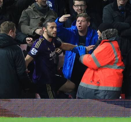 West Ham s Andy Carroll ends up in with Everton s fans FA Cup 3rd Round Replay - West Ham United - FC Everton - Upton Park - England - 13th January 2015 - EDITORIAL USE ONLY. No use with unauthorised audio, video, data, fixture lists, club league logos or live services. Online in-match use limited to 120 images, no video emulation. No use in betting, games or single club league player publications.